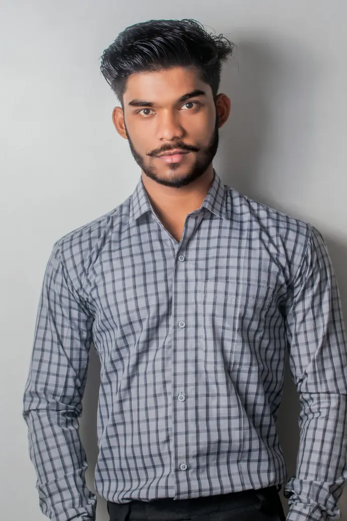 man in gray and black checkered sport shirt and black pants outfit